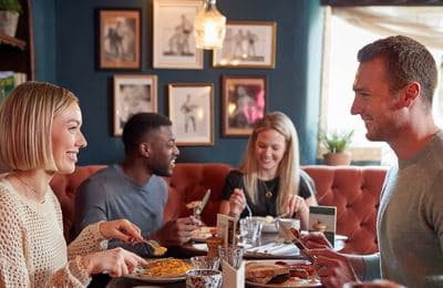 Group enjoying dinner at a restaurant